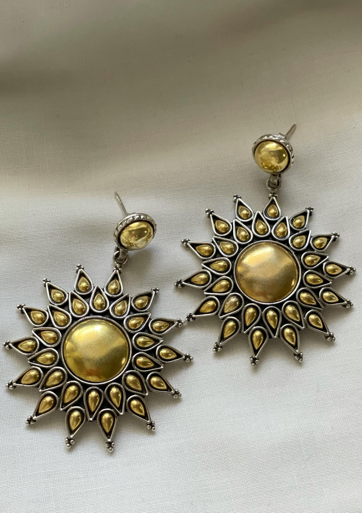 Surya earrings made from sterling silver with gold plating 